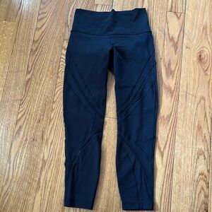 Black High-Waisted Leggings no size tag but they fit me I am a size 4-6 in Lulu